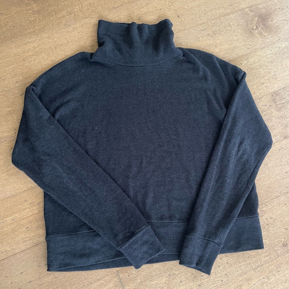 Community Turtle Neck Pullover. Black size small. Great weight to it. Made big.